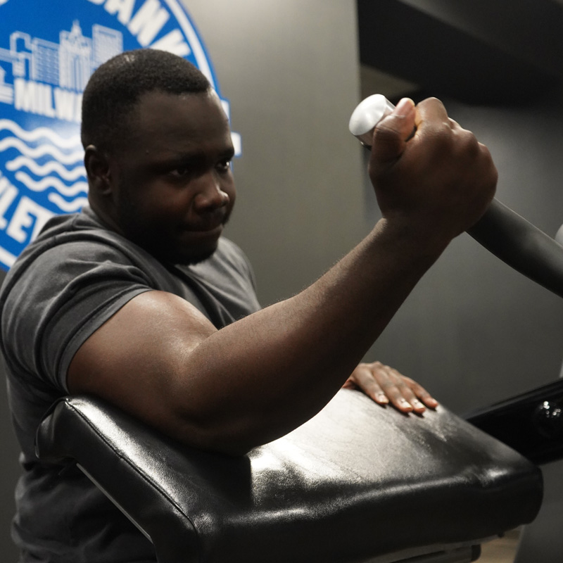 man working out his arms