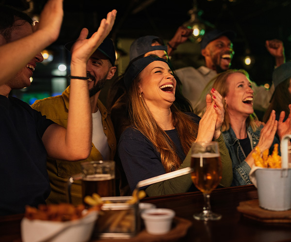 Friends cheering and laughing